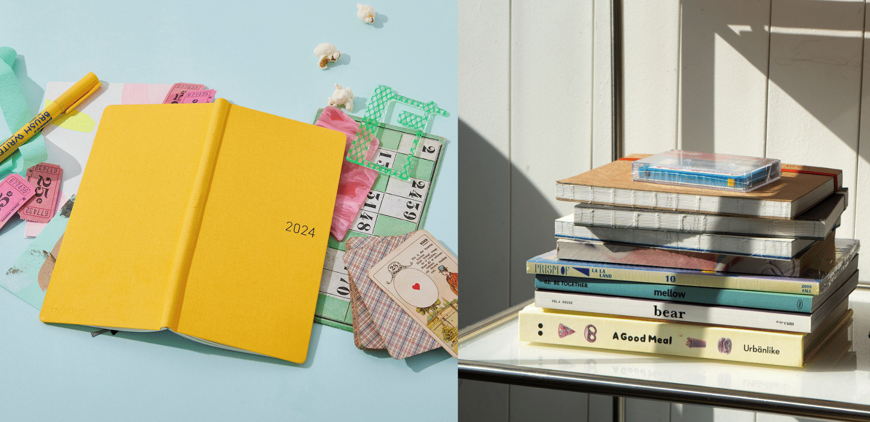 A yellow journal and stack of interesting books from the stationery shop Handmade and the Scholar.
