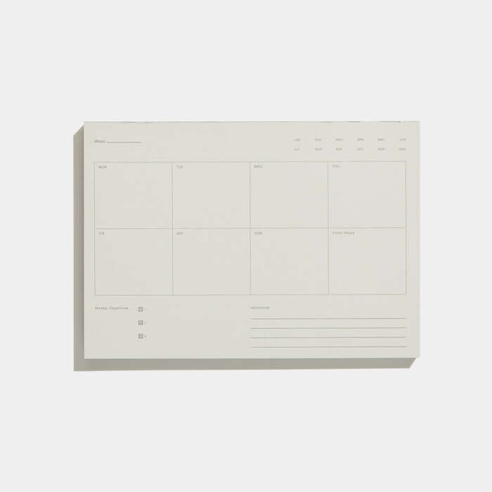A grey weekly undated notepad for planning the week