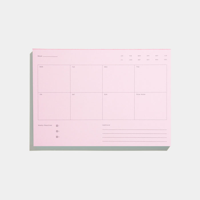 A pink weekly undated notepad for planning the week