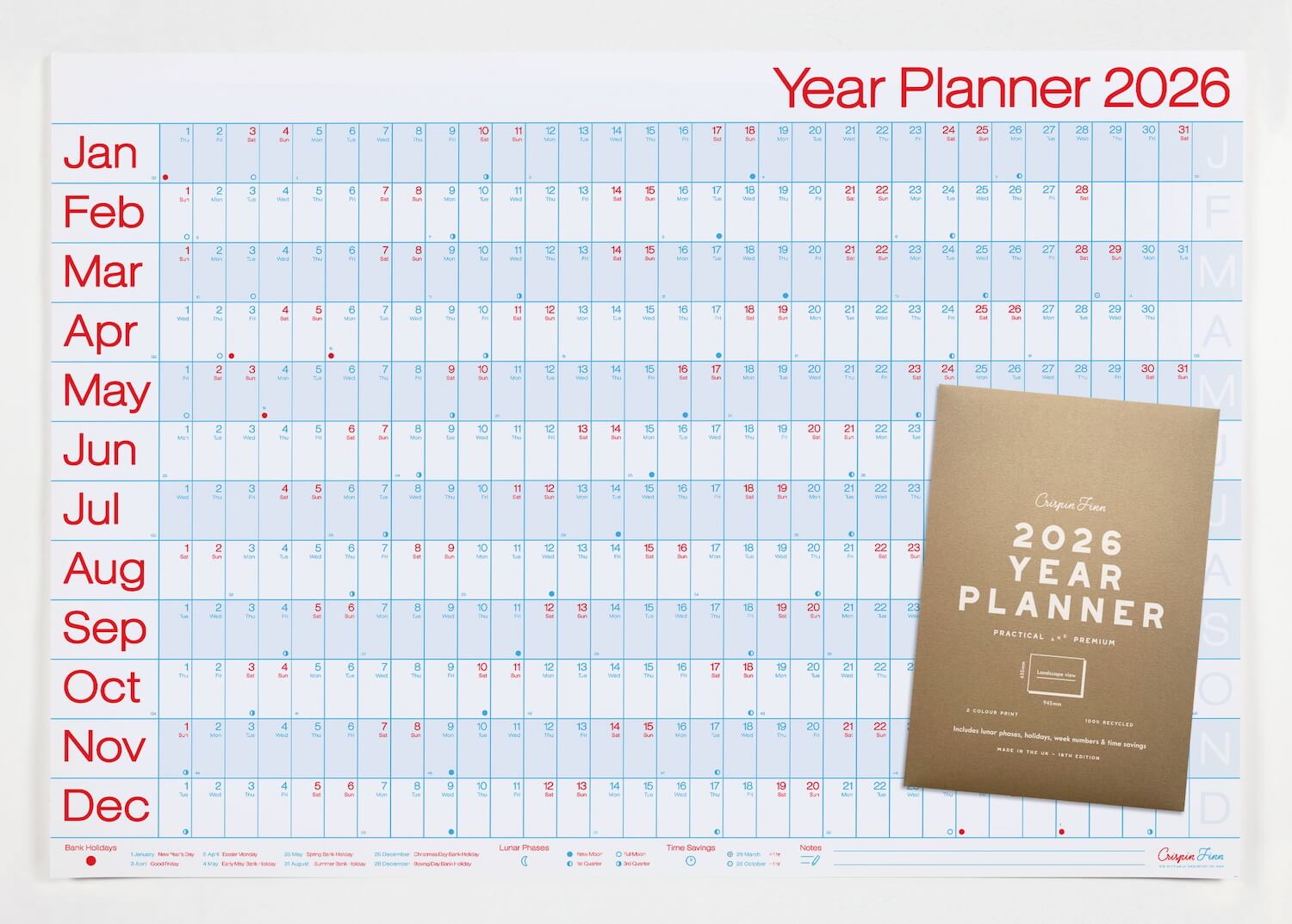 A blue and red wall planner by Crispin Finn for the year 2026